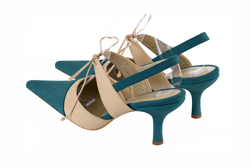 Chaussures habillées, élégantes et raffinées, ouvertes à l'arrière avec une bride sur le cou-de-pied, coloris bleu canard et beige vanille. Bout pointu. Haut. Talon fin. Cérémonie, soirée, cocktail, évènementiel. Personnalisation : Choix des cuirs, 
                des couleurs et des talons. Petites et grandes pointures. - Florence KOOIJMAN